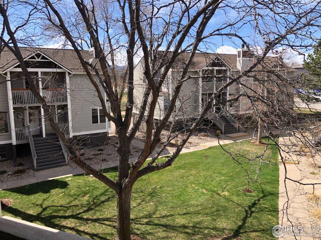 1717 West Drake Road, Unit 5B Fort Collins, CO 80526 - Photo 20 of 34 View to courtyard from bedroom balcony