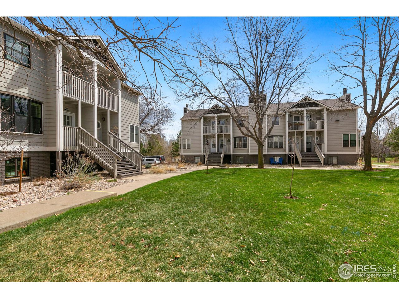 1717 West Drake Road, Unit 5B Fort Collins, CO 80526 - Photo 2 of 34 Front of property opens to the HOA maintained courtyard
