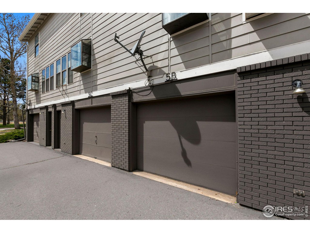 1717 West Drake Road, Unit 5B Fort Collins, CO 80526 - Photo 21 of 34 Ground level 1 car attached garage with storage space