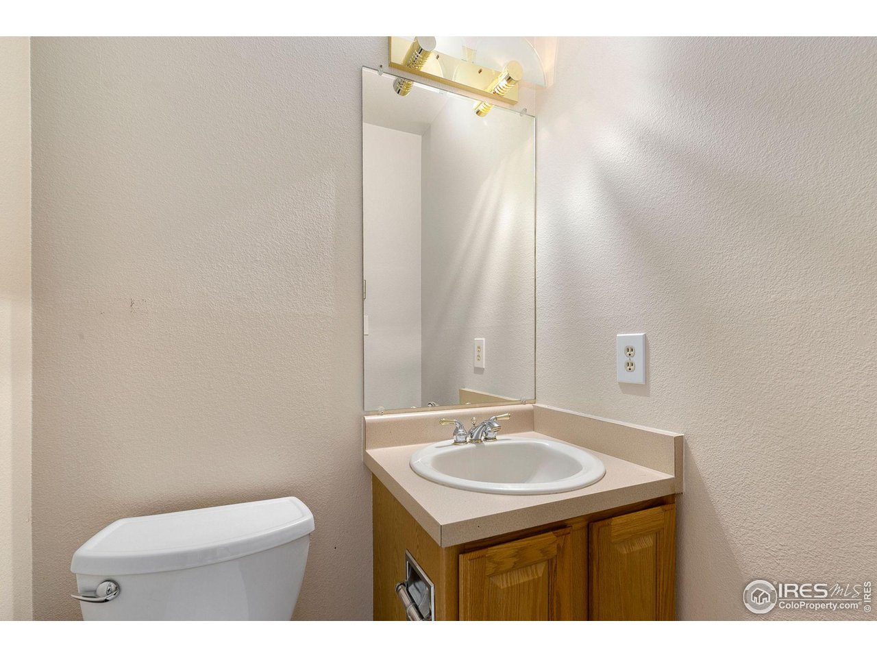 1717 West Drake Road, Unit 5B Fort Collins, CO 80526 - Photo 9 of 34 Half bathroom off living room and kitchen