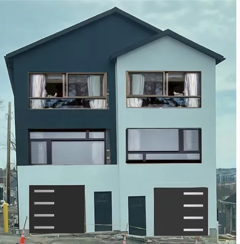 a front view of house with a yard