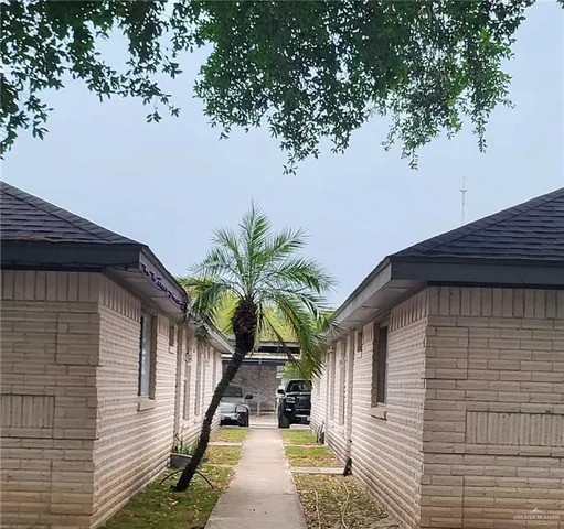 a house view with a garden space