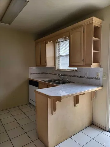 a view of kitchen cabinets