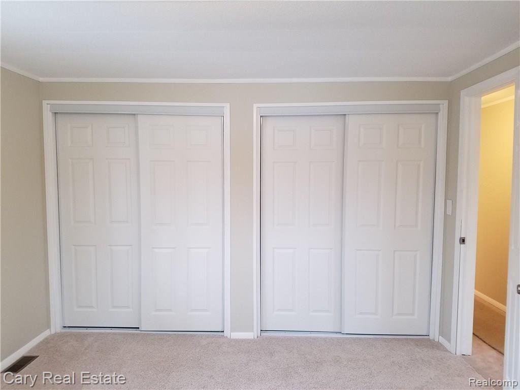 636 West Baker Road Highland, MI 48357 - Photo 15 of 22 Double closets in Master