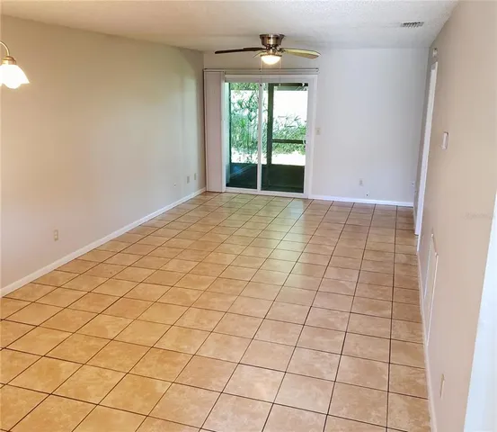 a view of an empty room and window