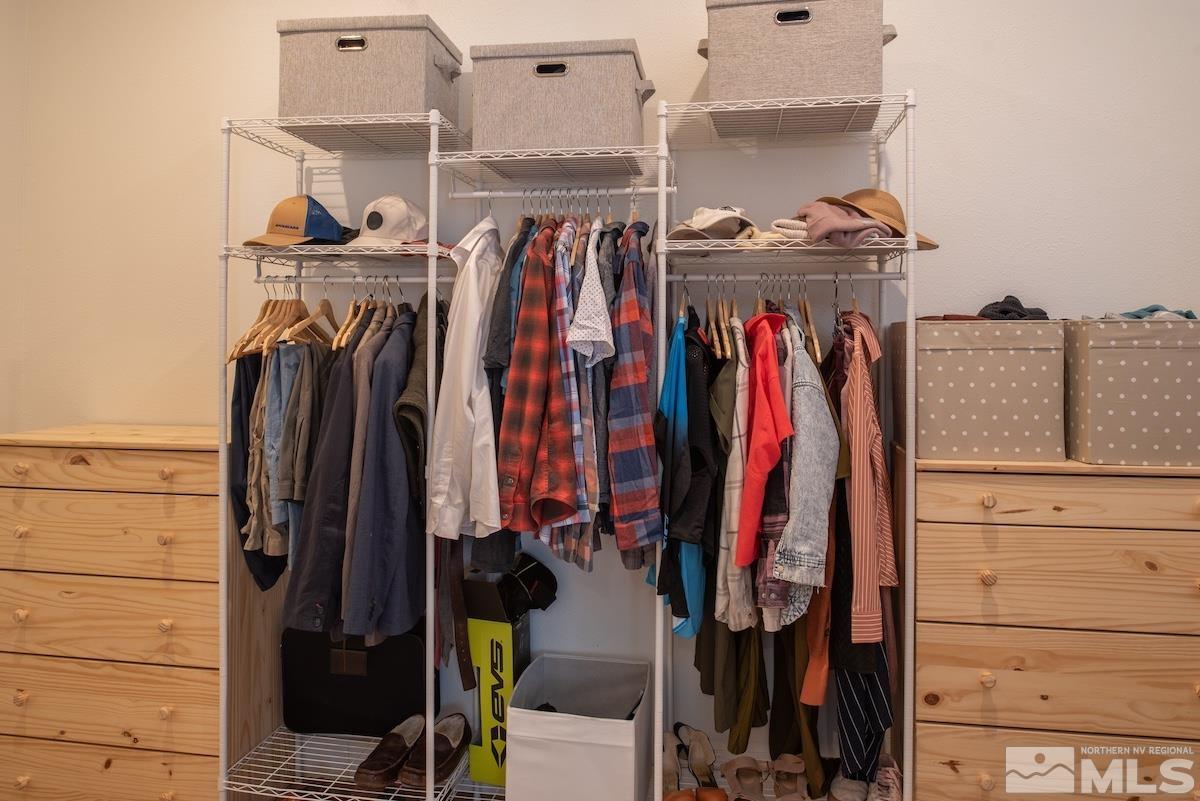 4600 Tybo Road Reno, NV 89521 - Photo 19 of 40 a view of walk in closet with clothes and shoes