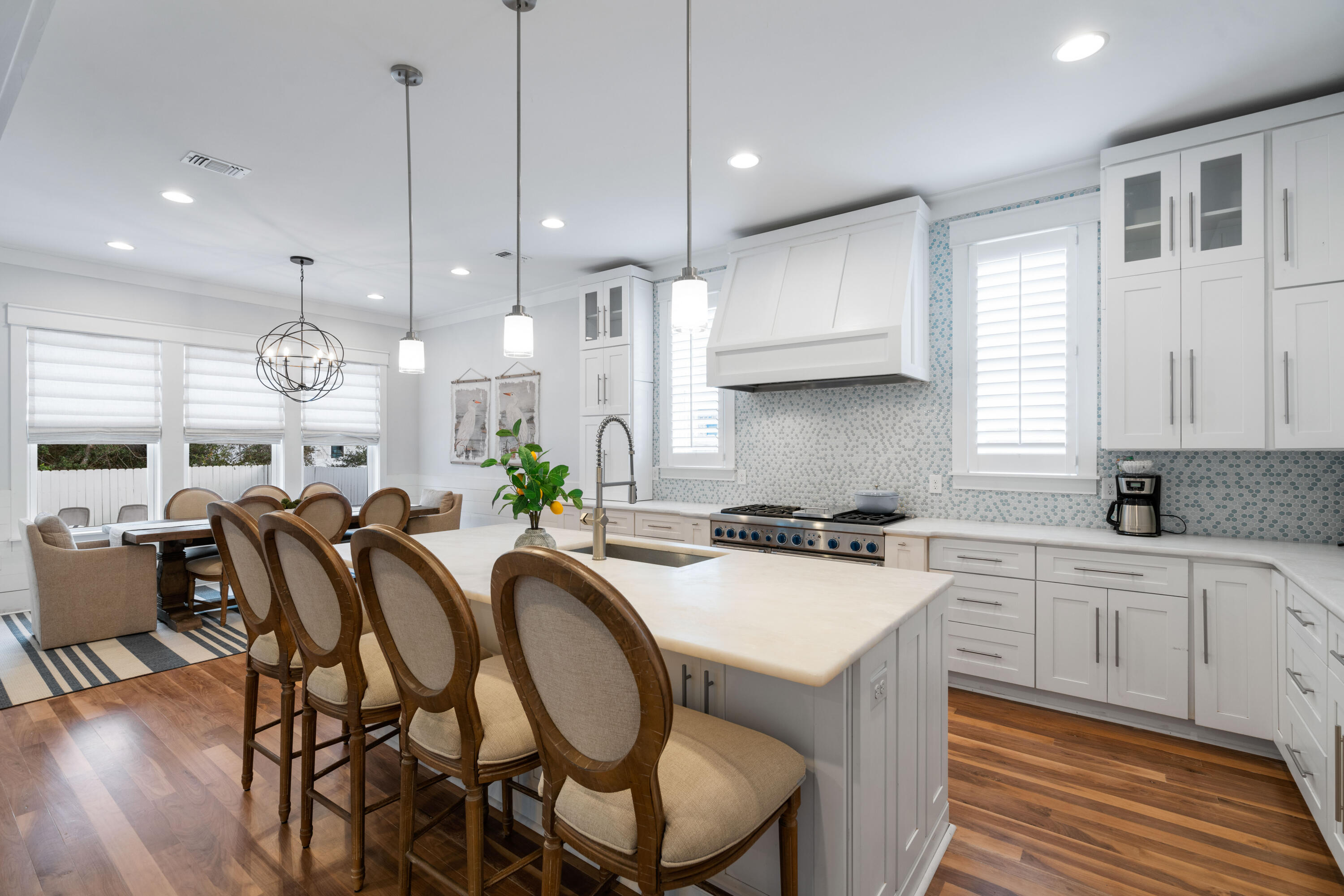 26 Dothan Avenue Santa Rosa Beach, FL 32459 - Photo 12 of 63 a kitchen with a table chairs stove and cabinets