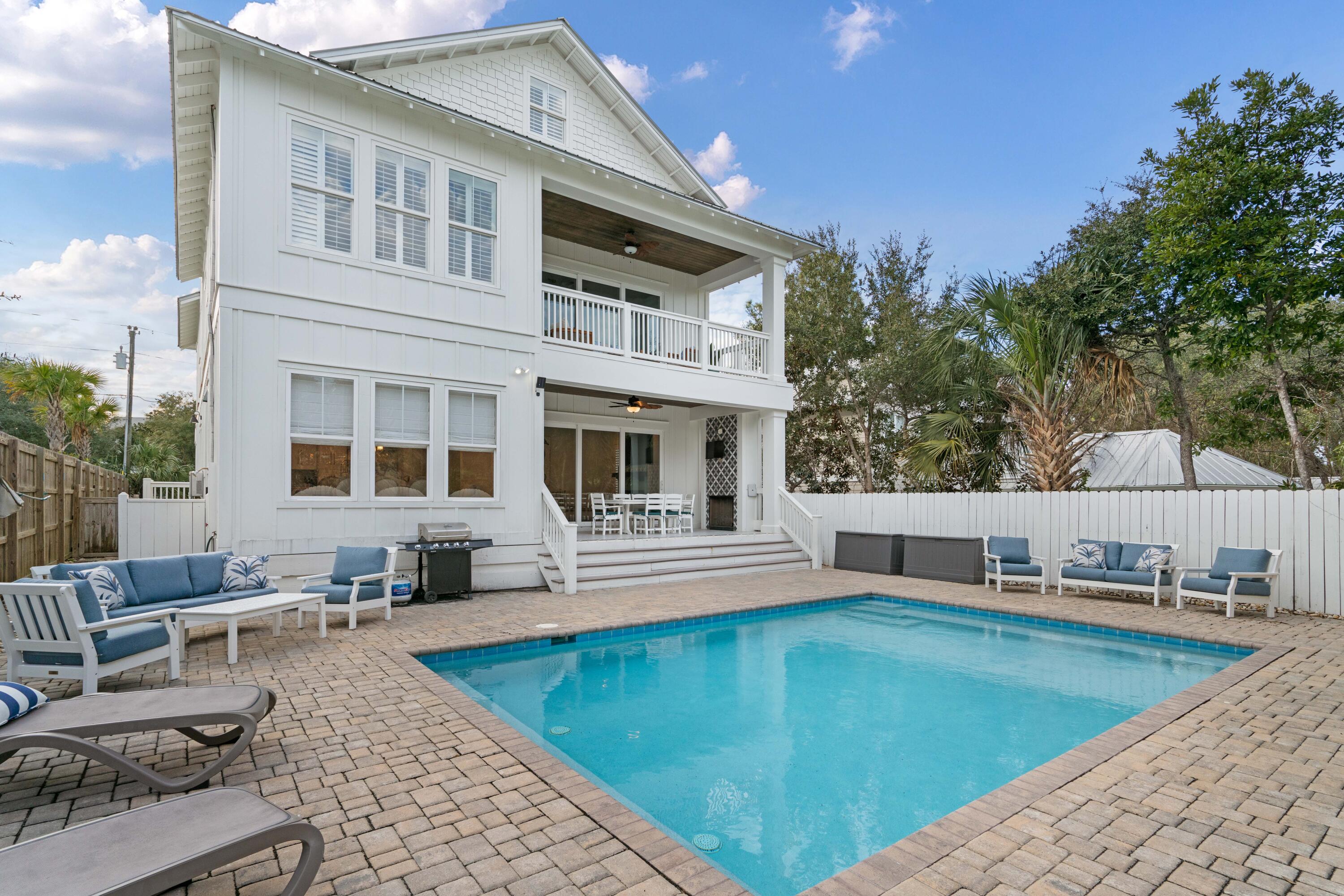 26 Dothan Avenue Santa Rosa Beach, FL 32459 - Photo 16 of 63 a view of a house with swimming pool and sitting area