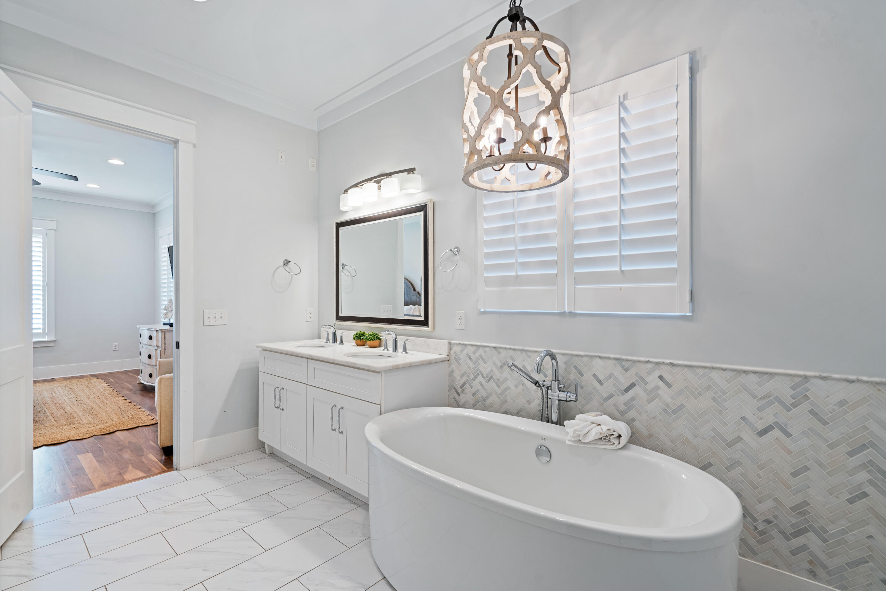 26 Dothan Avenue Santa Rosa Beach, FL 32459 - Photo 27 of 63 a spacious bathroom with a bathtub and a sink