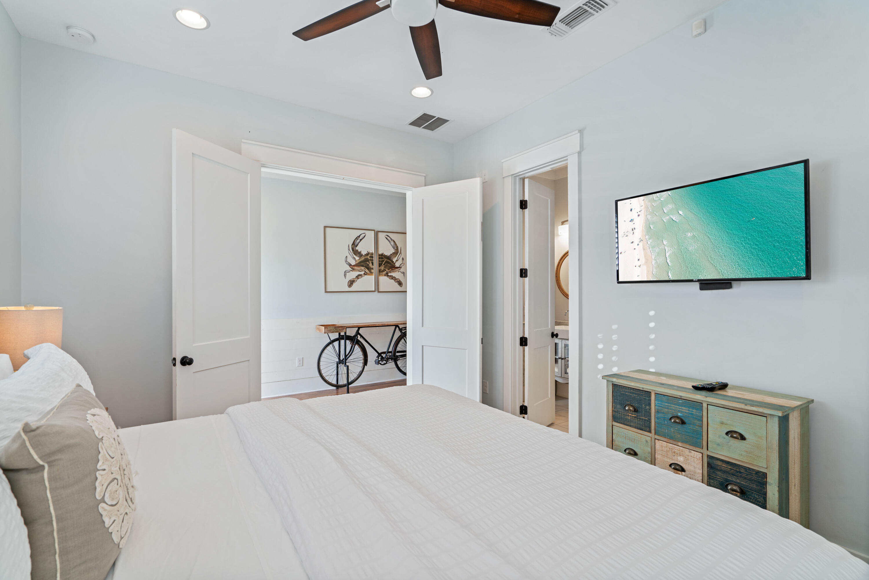 26 Dothan Avenue Santa Rosa Beach, FL 32459 - Photo 30 of 63 a bedroom with a bed and a tv on the dresser