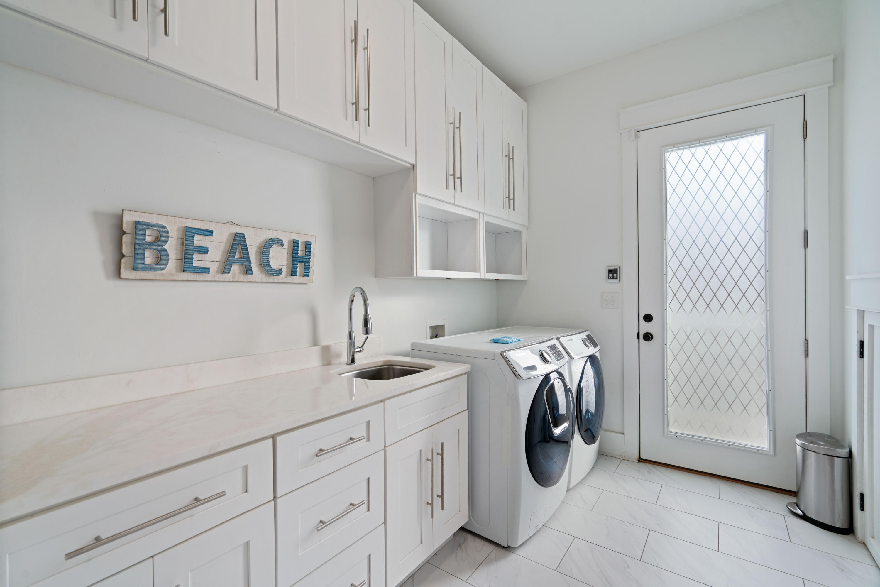 26 Dothan Avenue Santa Rosa Beach, FL 32459 - Photo 32 of 63 a utility room with cabinets