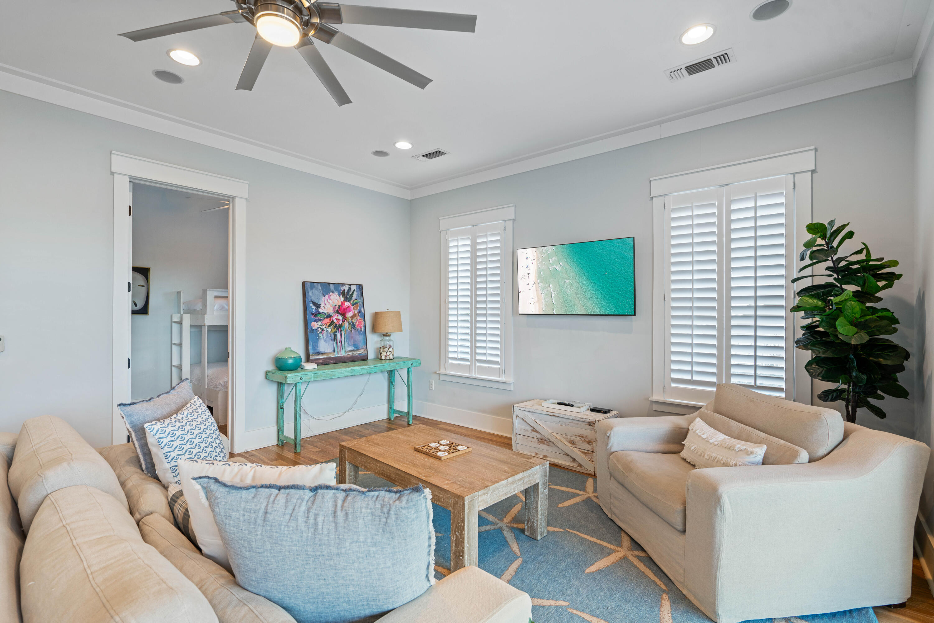26 Dothan Avenue Santa Rosa Beach, FL 32459 - Photo 35 of 63 a living room with furniture and a flat screen tv