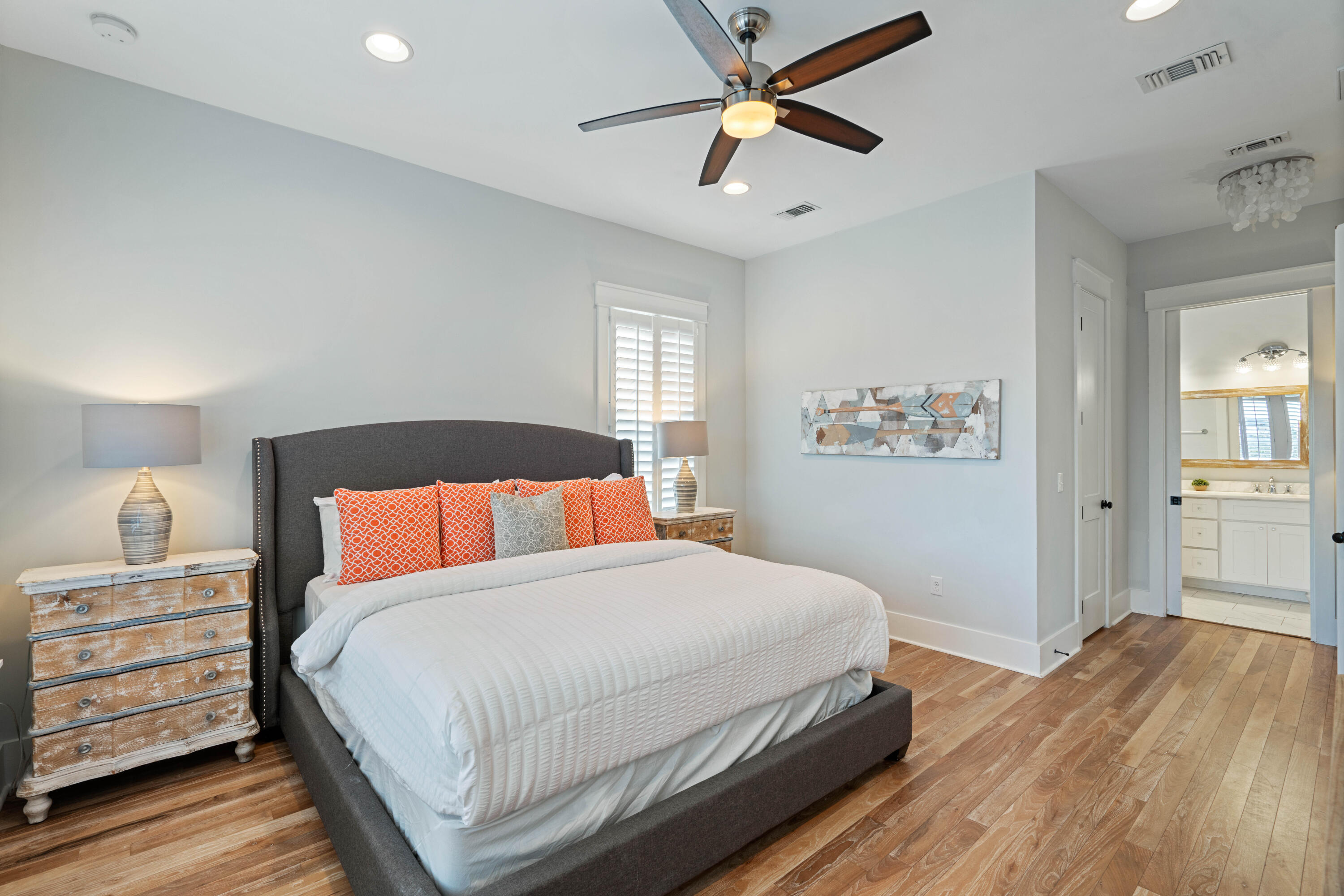 26 Dothan Avenue Santa Rosa Beach, FL 32459 - Photo 42 of 63 a bedroom with a large bed and a chandelier