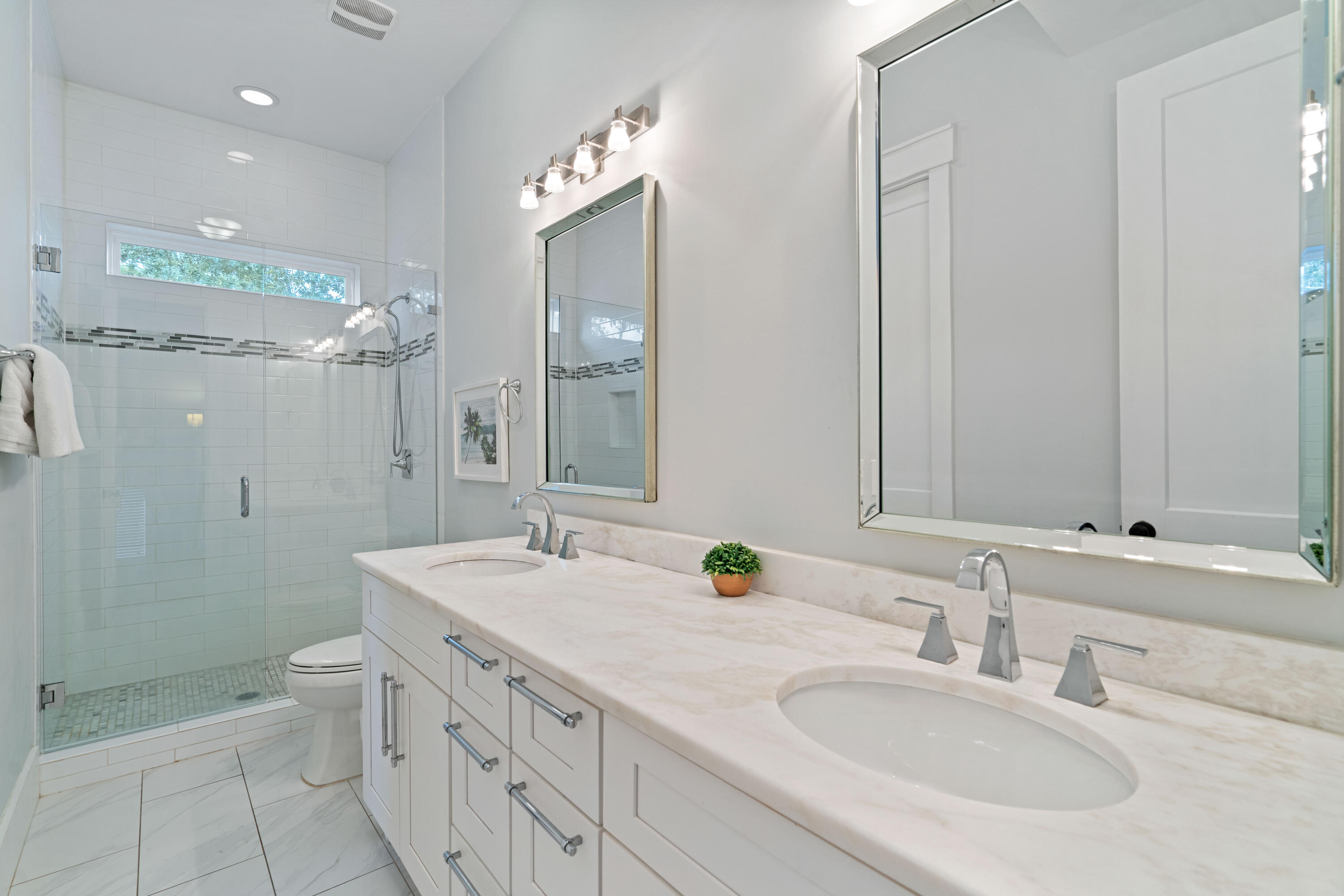 26 Dothan Avenue Santa Rosa Beach, FL 32459 - Photo 43 of 63 a bathroom with a double vanity sink mirror and shower
