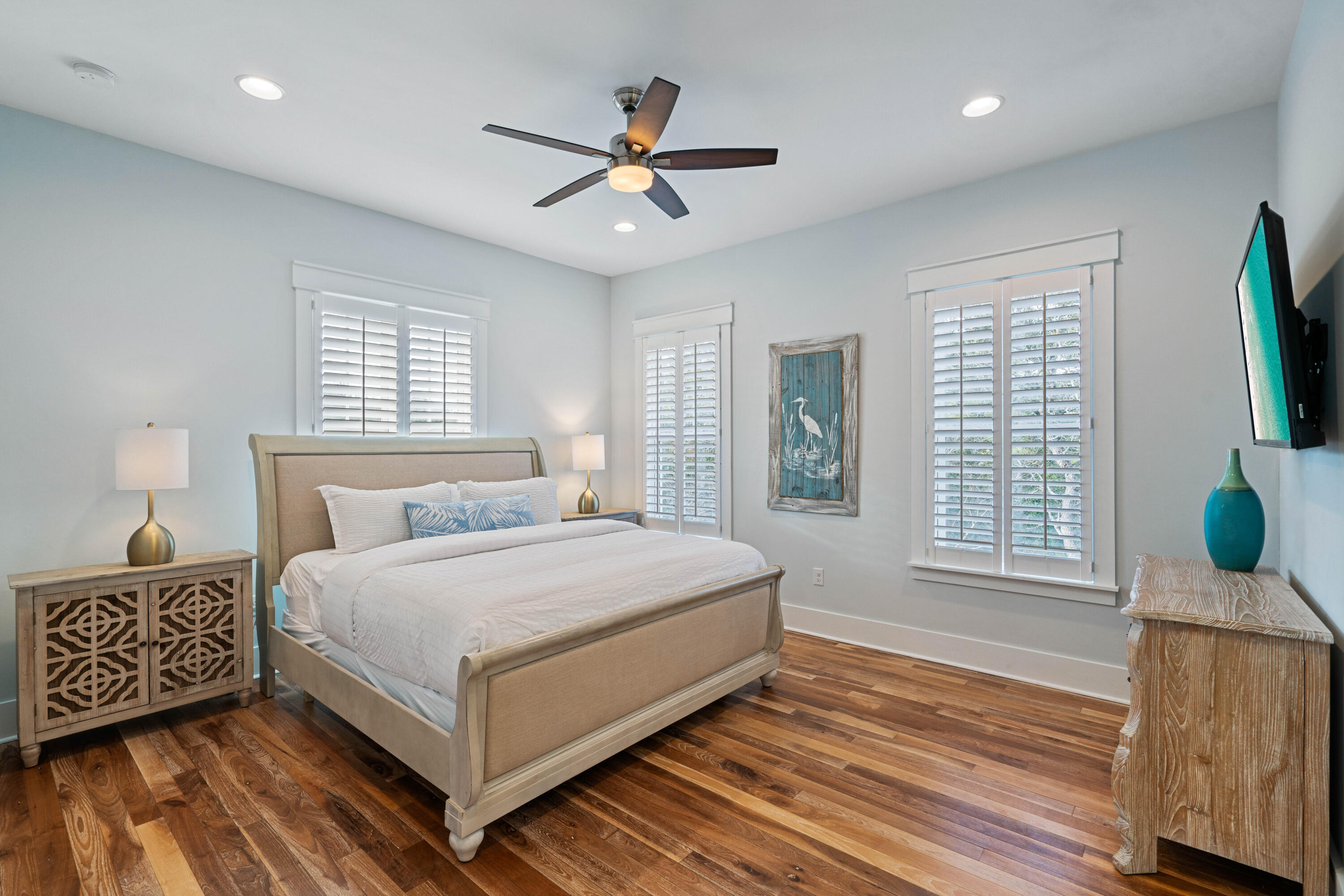 26 Dothan Avenue Santa Rosa Beach, FL 32459 - Photo 48 of 63 a bedroom with a large bed and a chandelier
