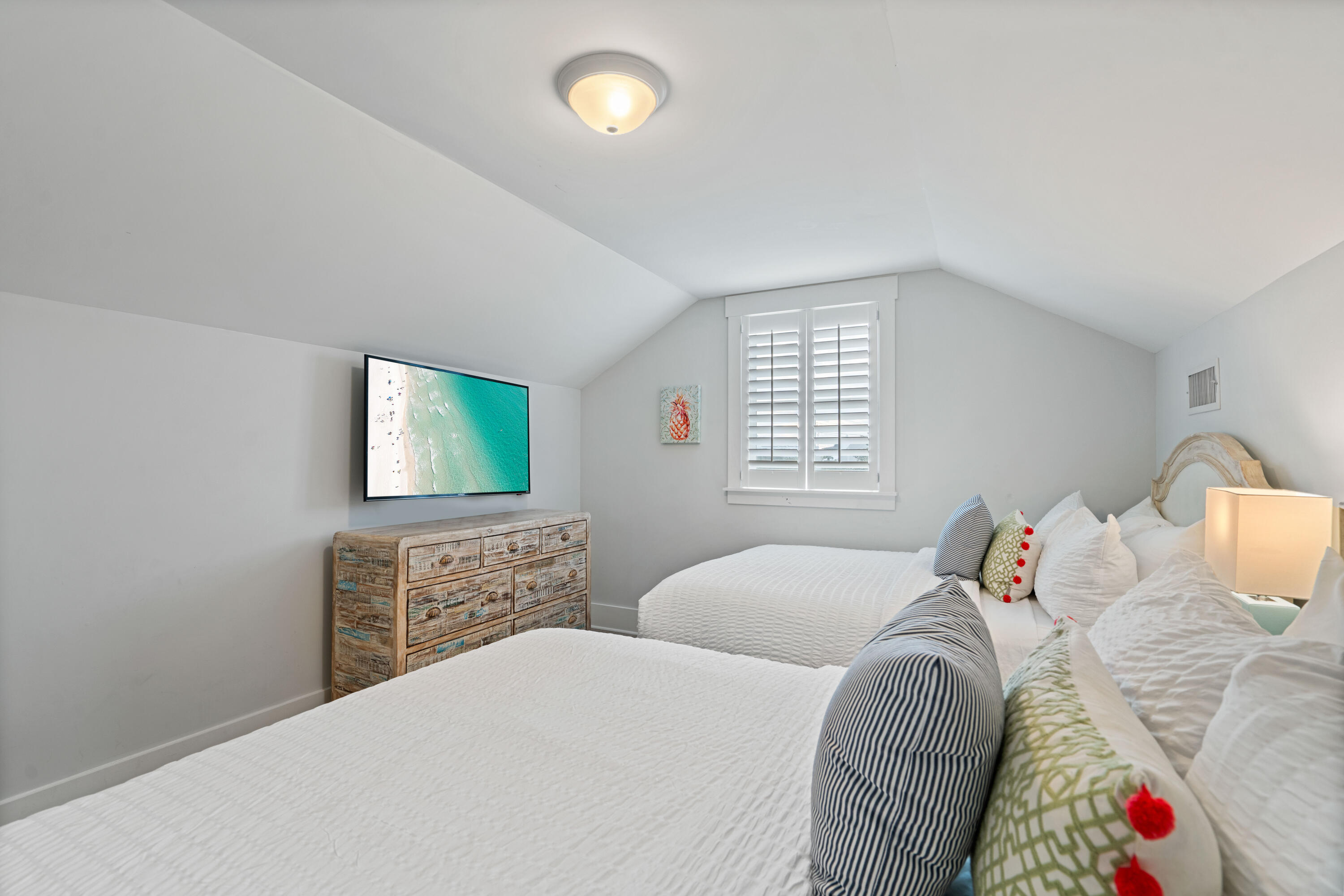 26 Dothan Avenue Santa Rosa Beach, FL 32459 - Photo 55 of 63 a bedroom with a bed and a flat screen tv