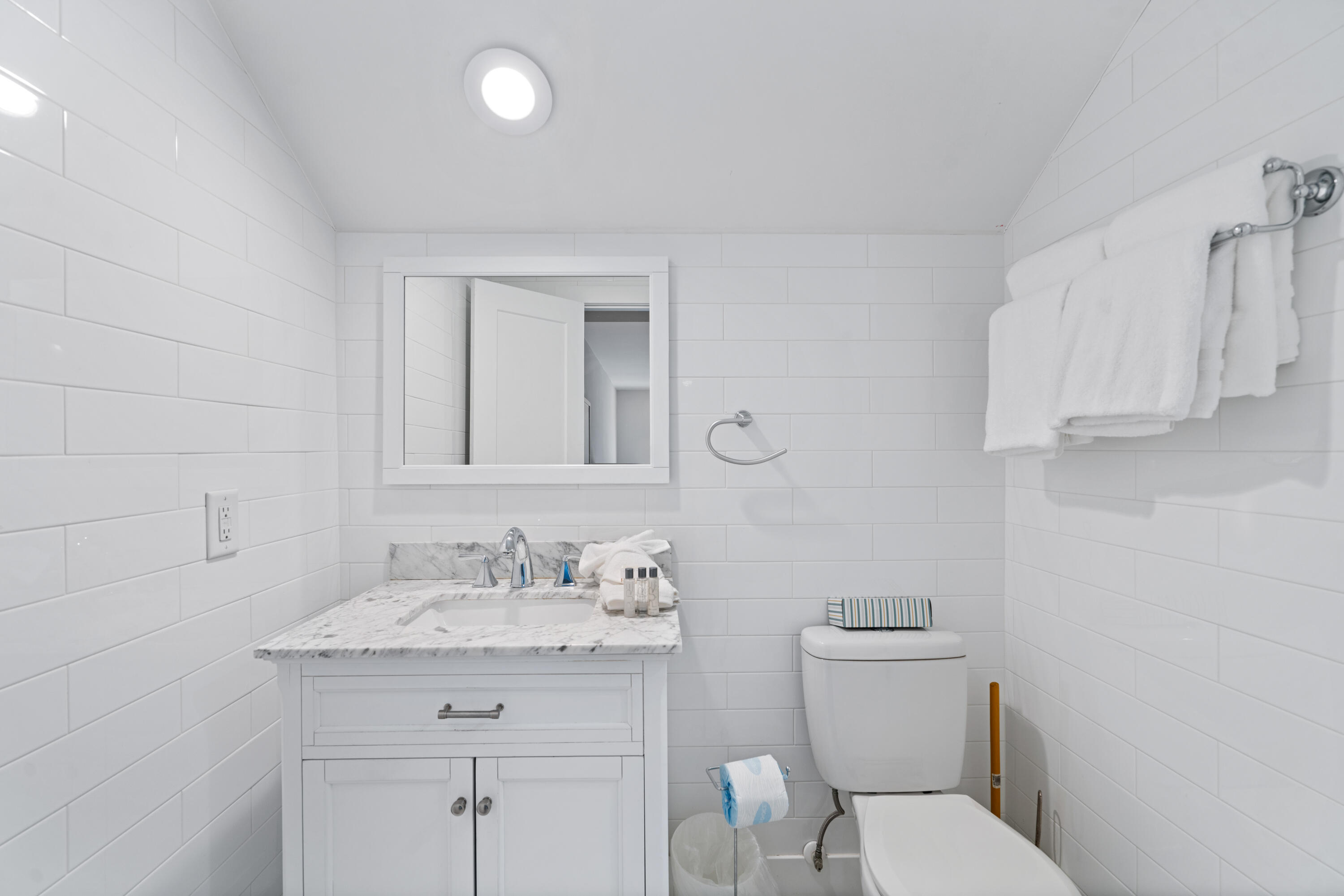 26 Dothan Avenue Santa Rosa Beach, FL 32459 - Photo 56 of 63 a bathroom with a granite countertop toilet sink and mirror