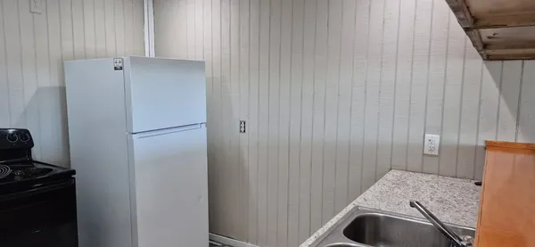 a bathroom with a sink and a toilet