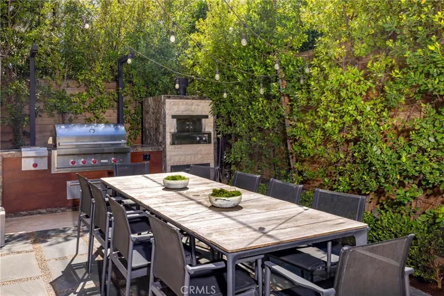 a patio with table and chairs