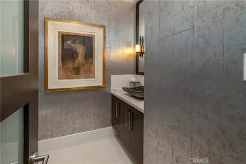 a kitchen with a stove and a refrigerator