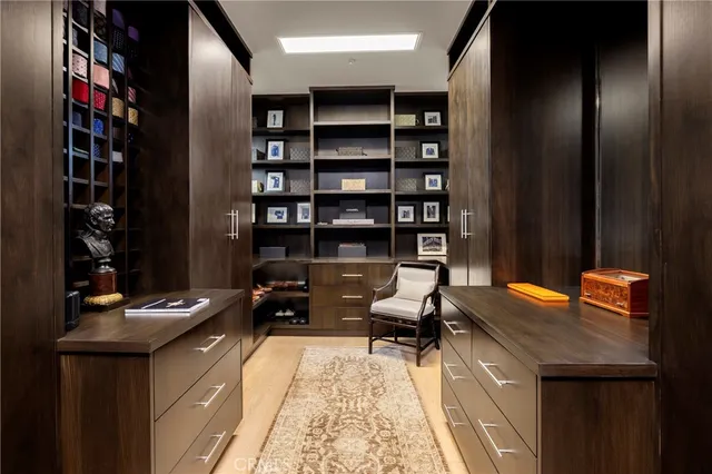 a reading room with furniture and book shelf