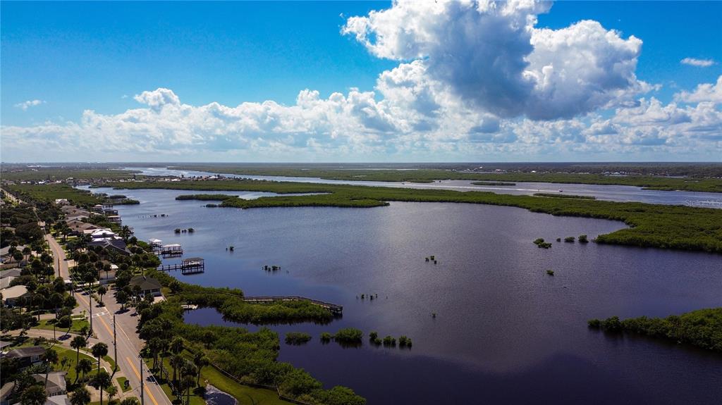 4736 South Atlantic Avenue Ponce Inlet, FL 32127 - Photo 14 of 32 a view of a lake with outdoor space