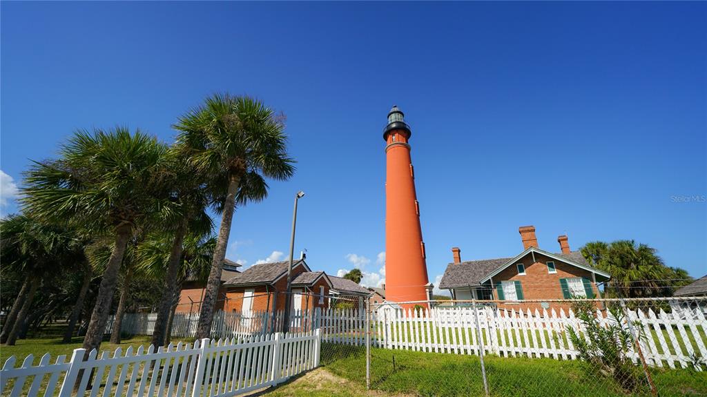 4736 South Atlantic Avenue Ponce Inlet, FL 32127 - Photo 32 of 32 a view of a house with a yard