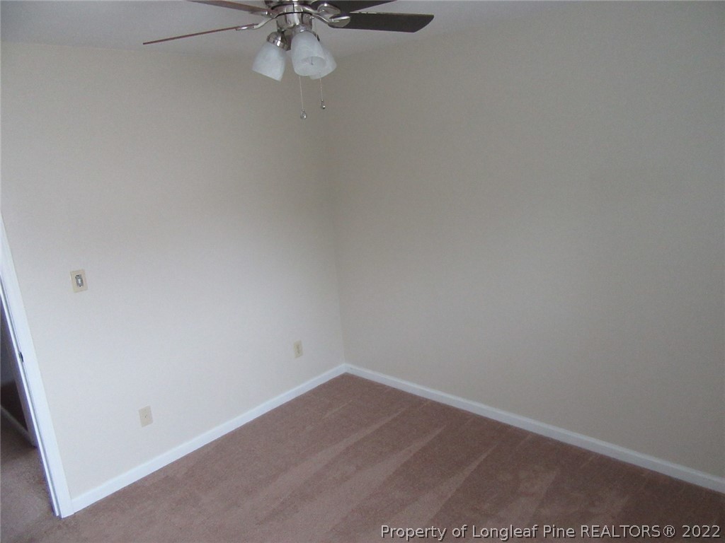 461 Camden Road Raeford, NC 28376 - Photo 16 of 18 a view of a room with a hanging light and a sink
