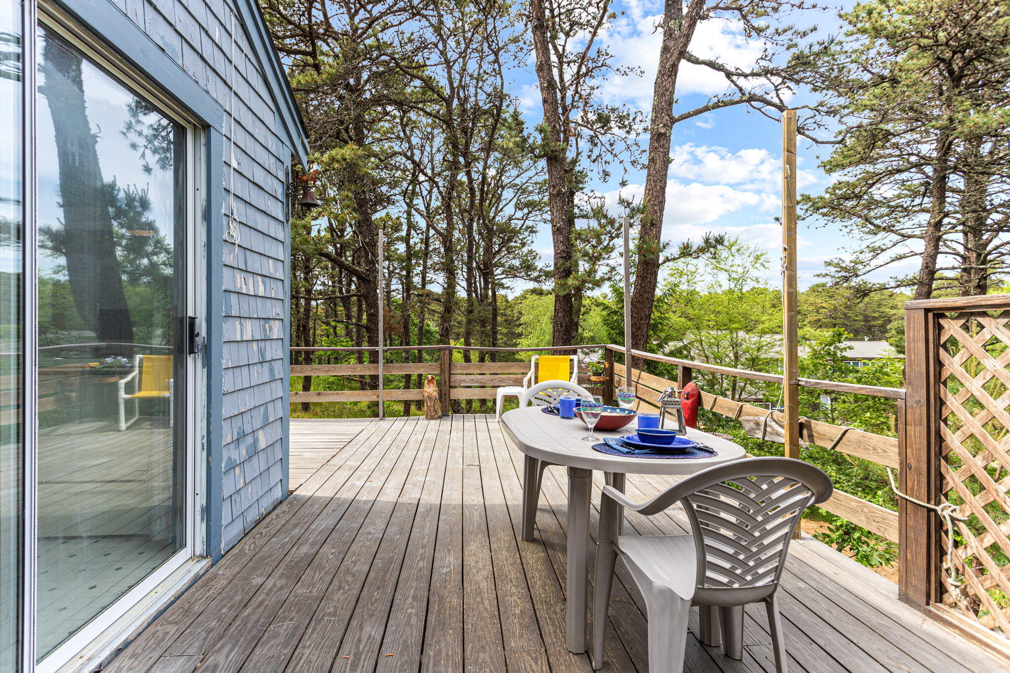 135 Daniels Drive Wellfleet, MA 02667 - Photo 15 of 21 a balcony with furniture and wooden floor
