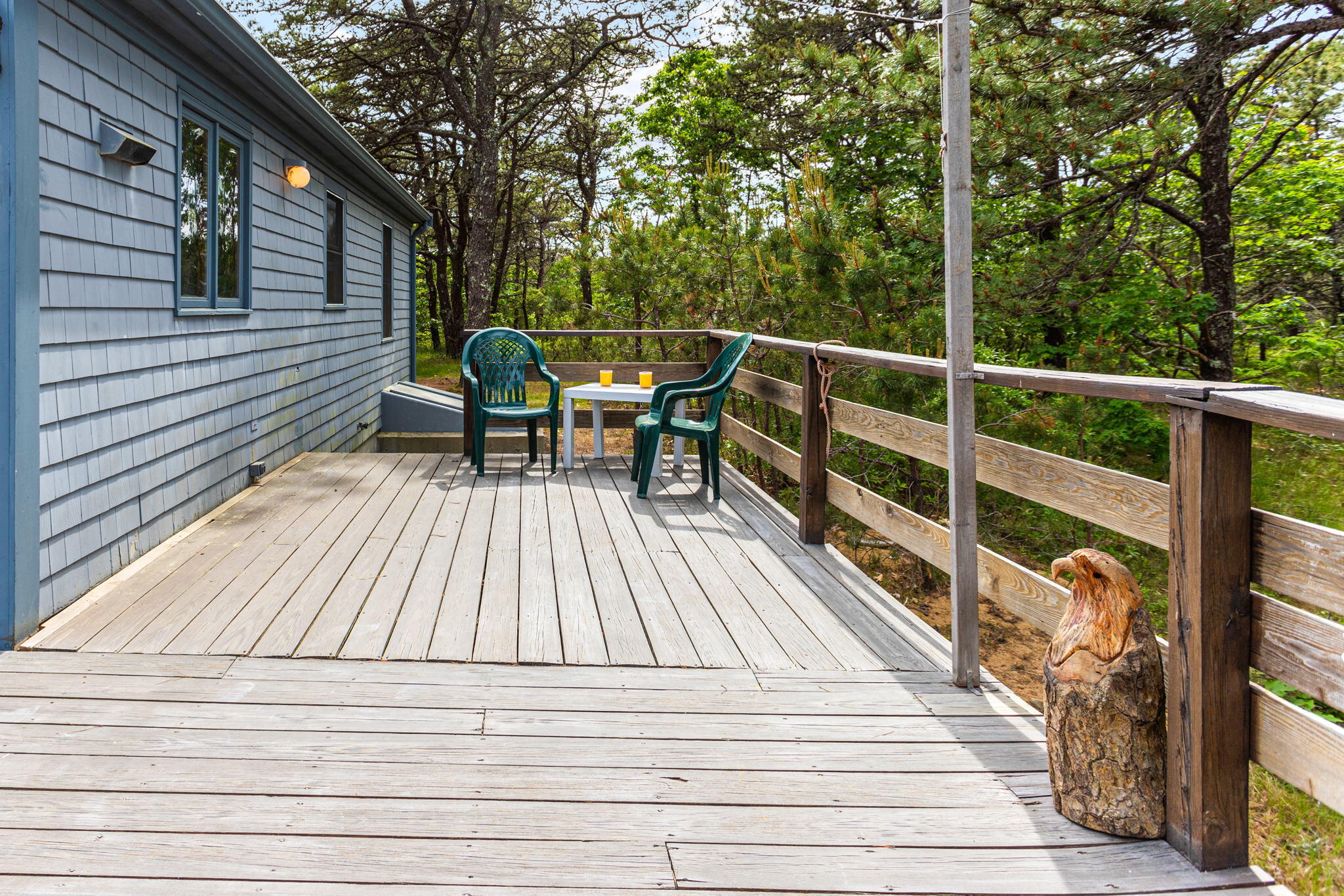 135 Daniels Drive Wellfleet, MA 02667 - Photo 18 of 21 a view of a chairs on a deck