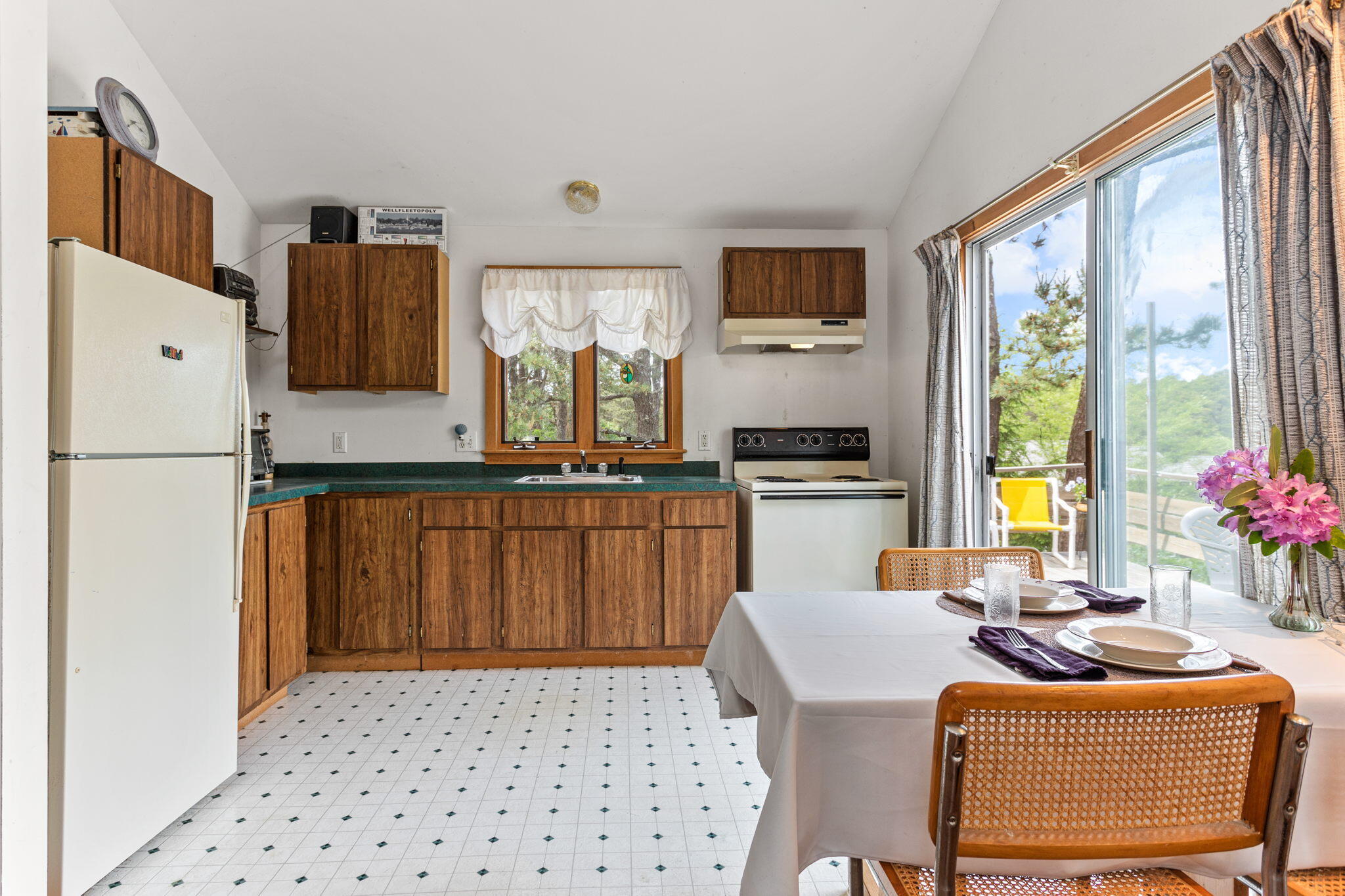135 Daniels Drive Wellfleet, MA 02667 - Photo 6 of 21 kitchen dining and slider to deck