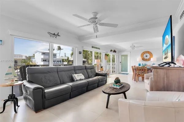a living room with furniture and a table