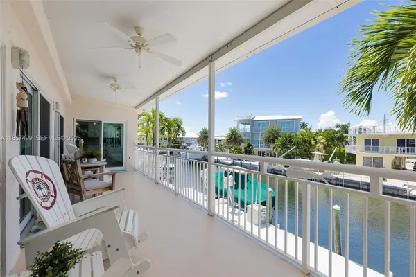 a bathroom with a toilet sink and shower