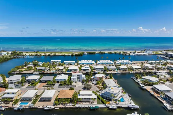 a view of a lake with furniture