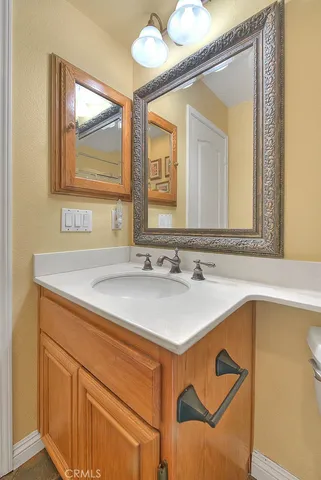 a view of a livingroom with furniture and a flat screen tv