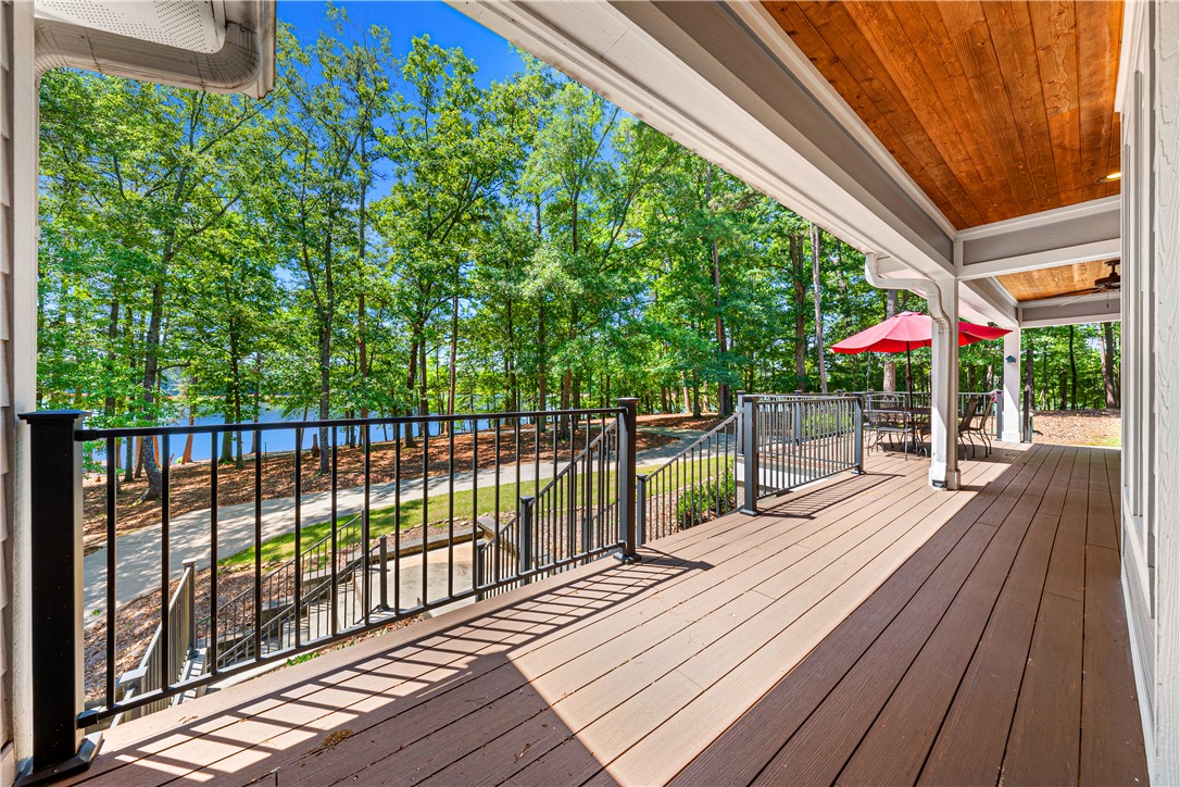 285 Bertha Allen Road Westminster, SC 29693 - Photo 27 of 50 Lakeside views from this expansive deck, perfect for peaceful mornings or entertaining evenings.