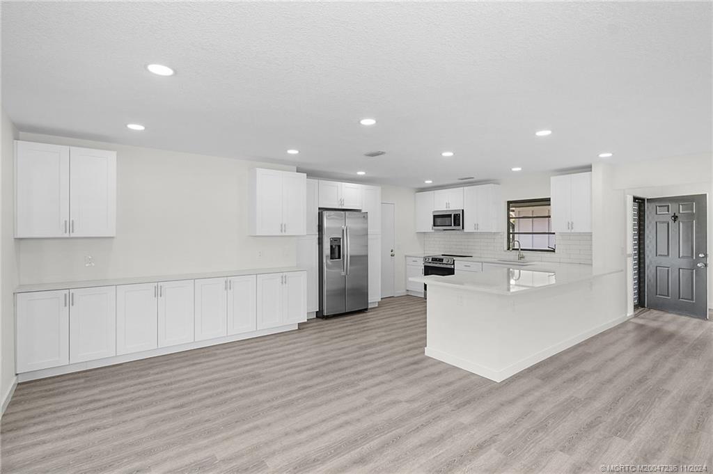 5635 Southeast Miles Grant Road Stuart, FL 34997 - Photo 11 of 73