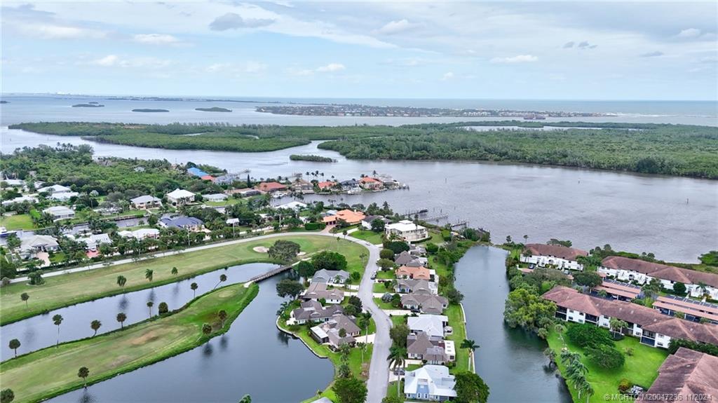 5635 Southeast Miles Grant Road Stuart, FL 34997 - Photo 65 of 73 a view of a city with lots of trees