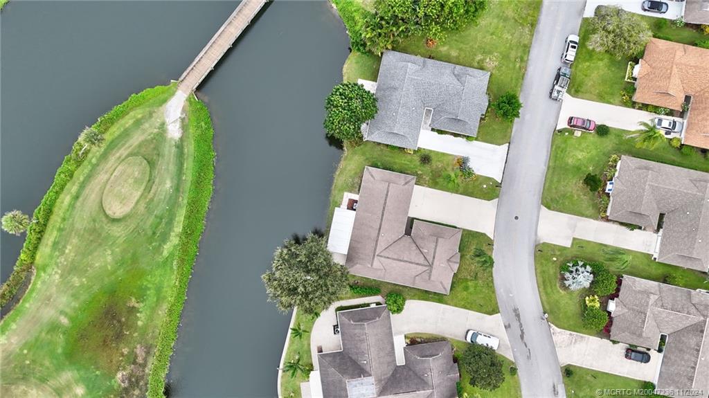 5635 Southeast Miles Grant Road Stuart, FL 34997 - Photo 66 of 73 an aerial view of a house