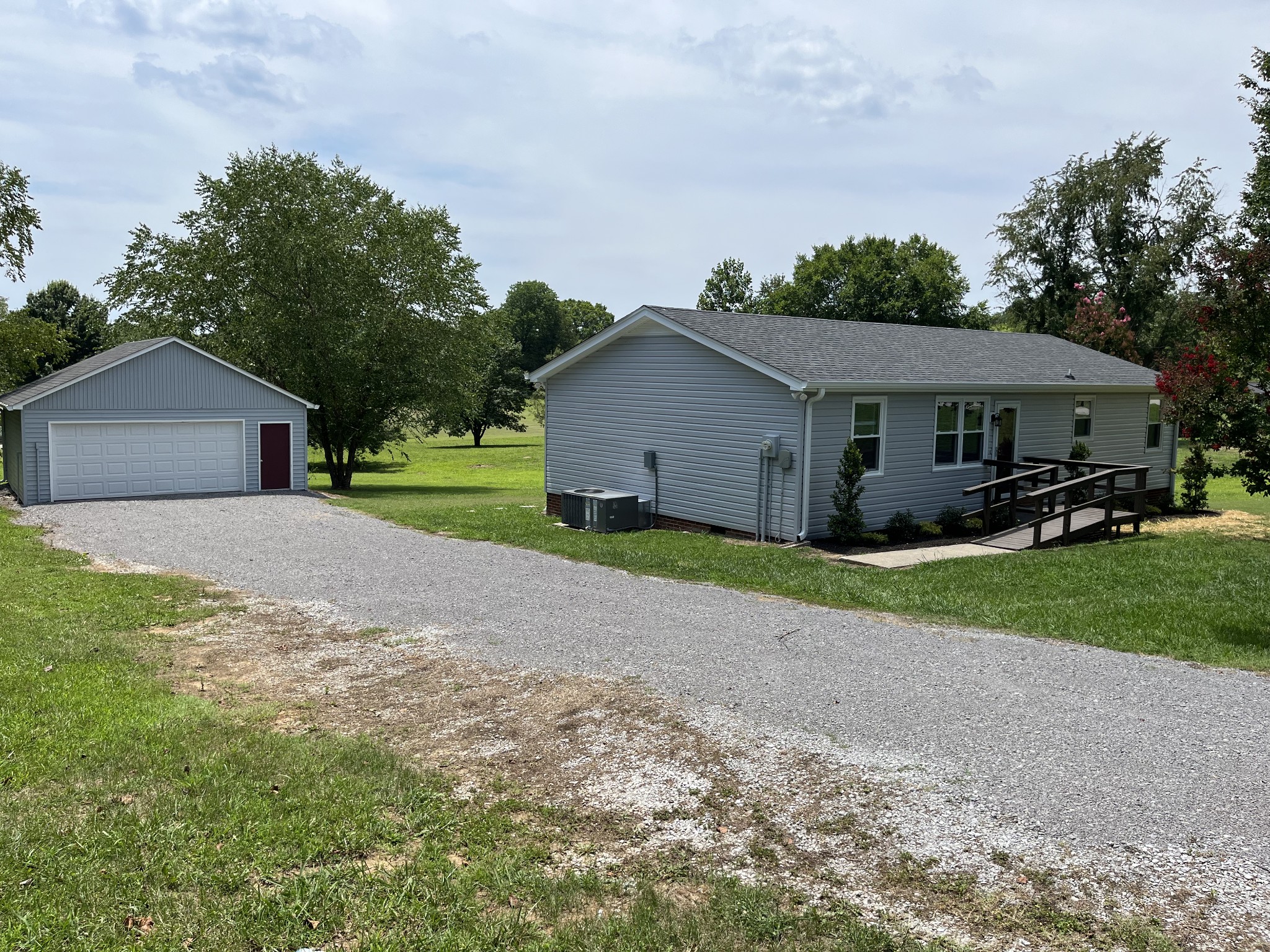 5380 Chicken Road Lebanon, TN 37090 - Photo 2 of 17 a front view of a house with garden