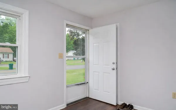 a view of an empty room and window