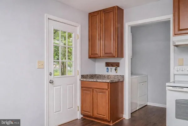 a view of cabinets and window