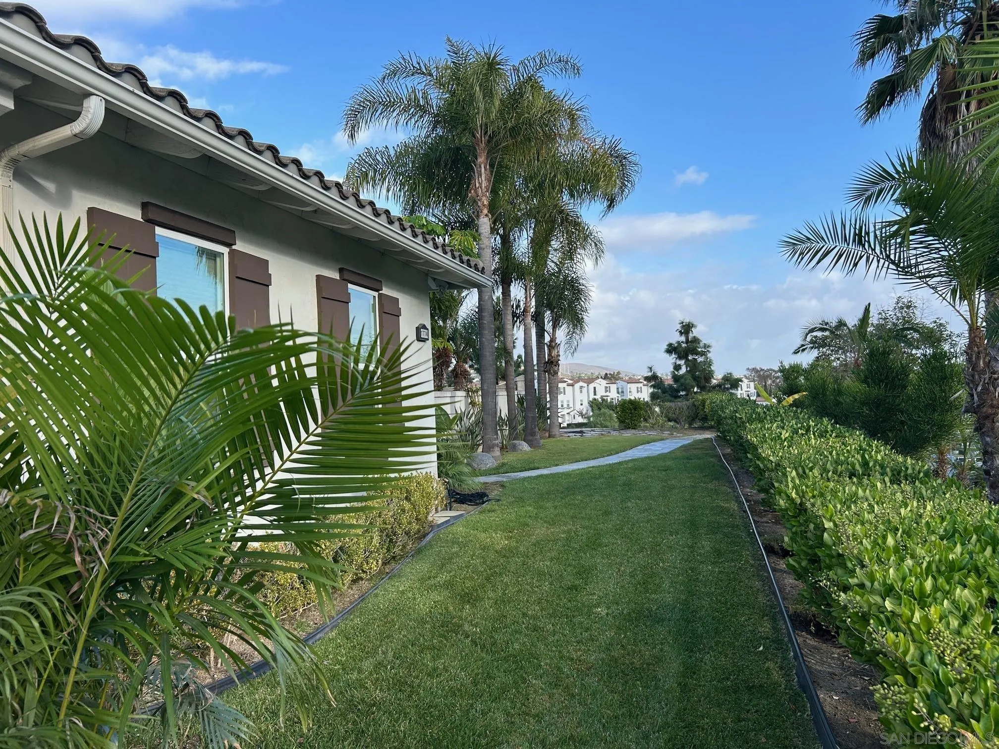 1774 Dove Lane Carlsbad, CA 92011 - Photo 20 of 25 a front view of a house with a yard
