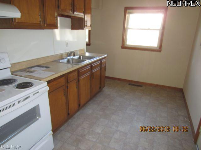 1944 Green Road Madison, OH 44057 - Photo 5 of 11 newer flooring and stove