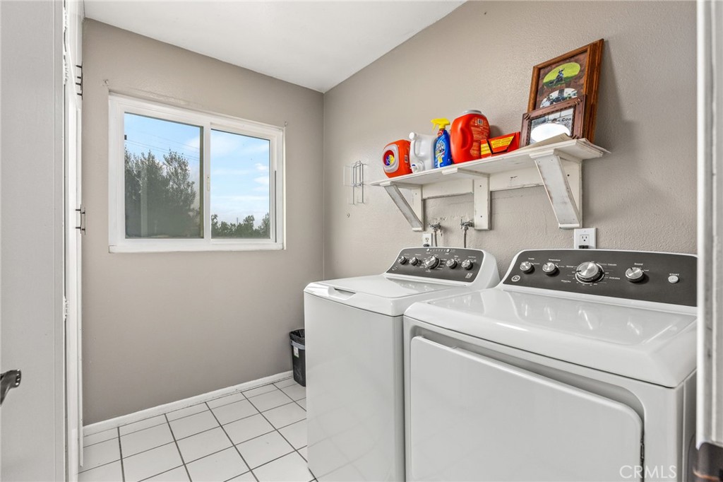 3998 Bluff Street Norco, CA 92860 - Photo 32 of 74 a utility room with dryer and washer