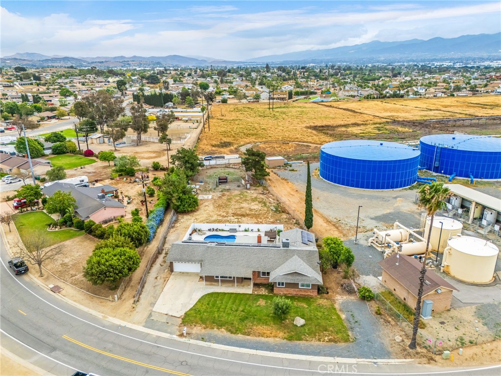 3998 Bluff Street Norco, CA 92860 - Photo 63 of 74 an aerial view of residential houses with outdoor space