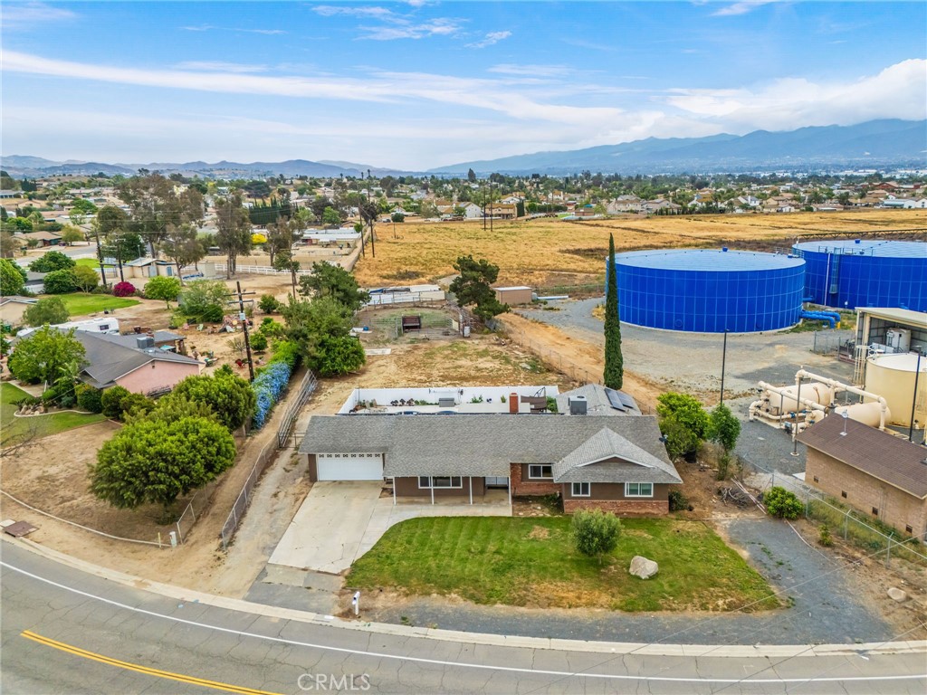 3998 Bluff Street Norco, CA 92860 - Photo 64 of 74 an aerial view of residential houses with outdoor space and swimming pool