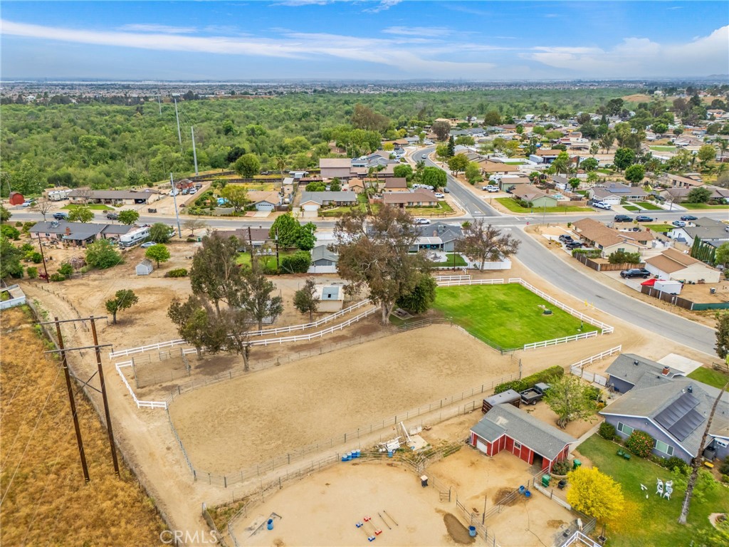 3998 Bluff Street Norco, CA 92860 - Photo 66 of 74 an aerial view of residential houses with outdoor space