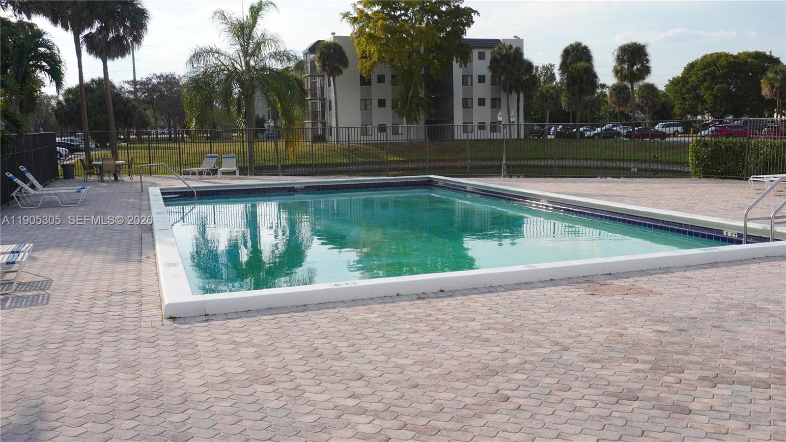 3710 North Pine Island Road, Unit 320 Sunrise, FL 33351 - Photo 12 of 14 a view of swimming pool