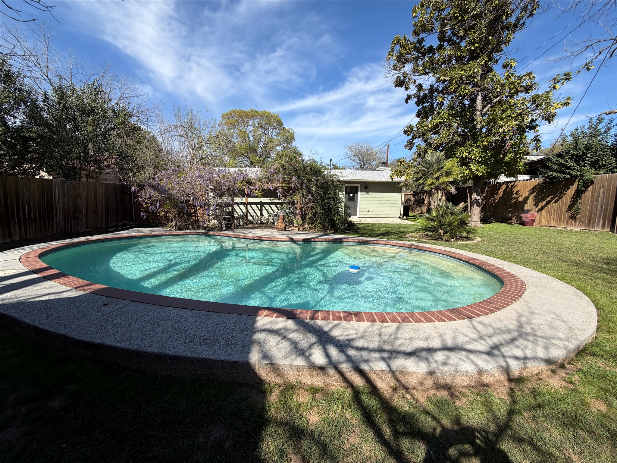 301 Sheraton Avenue Austin, TX 78745 - Photo 22 of 27 Did I mention the big backyard? Here's another angle of the pool and spacious yard, plenty of room for all your outdoor dreams!